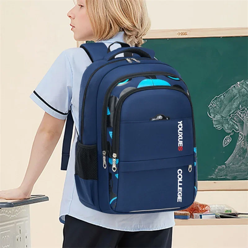 New Children School Bags Kids Backpack In Primary Schoolbag For Teenager Boys Waterproof Backpacks Book Bag New Children School Bags Kids Backpack In Primary Schoolbag For Teenager Boys Waterproof Backpacks Book Bag
